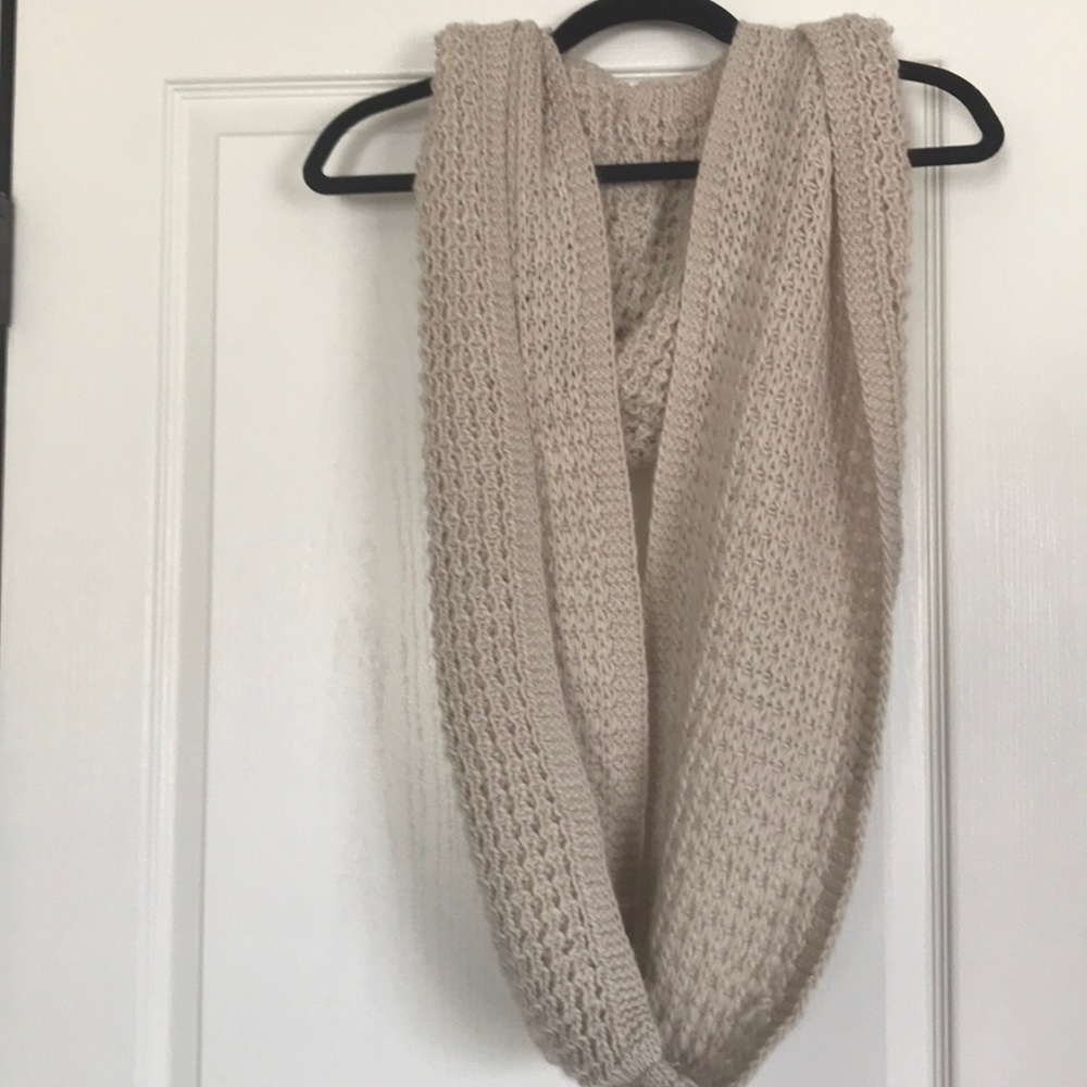 Knitted scarf with hood